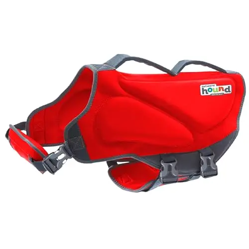 Outward Hound Dawson dog life jacket in red with neoprene side panels and dual grab handles.