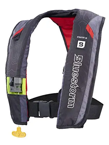 BLUESTORM Stratus 35 inflatable life vest in red, showing the front zippered pocket.