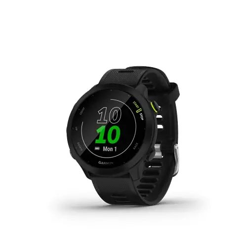 Garmin Forerunner 55 GPS running watch in black, displayed on a running trail.