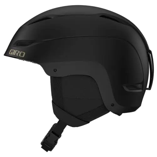 Giro Ceva ski helmet in matte black with botanical design, highlighting its hard shell construction and adjustable dial.