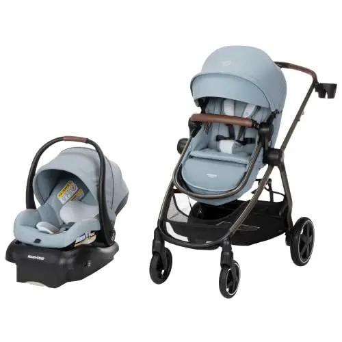 Maxi-Cosi Zelia Luxe 5-in-1 Modular Travel System in New Hope Grey, highlighting its premium fabrics and sleek design.