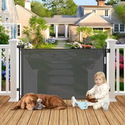 BETERTEK weatherproof black retractable dog gate extended across a deck opening.