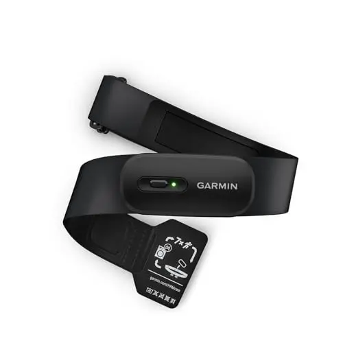 Garmin HRM 200 black chest strap heart rate monitor on a gray background